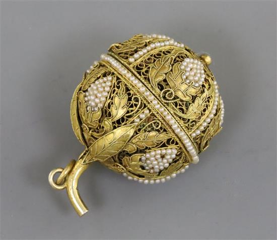 A 19th century French? silver gilt filligree and seed pearl set pomander, 39mm.